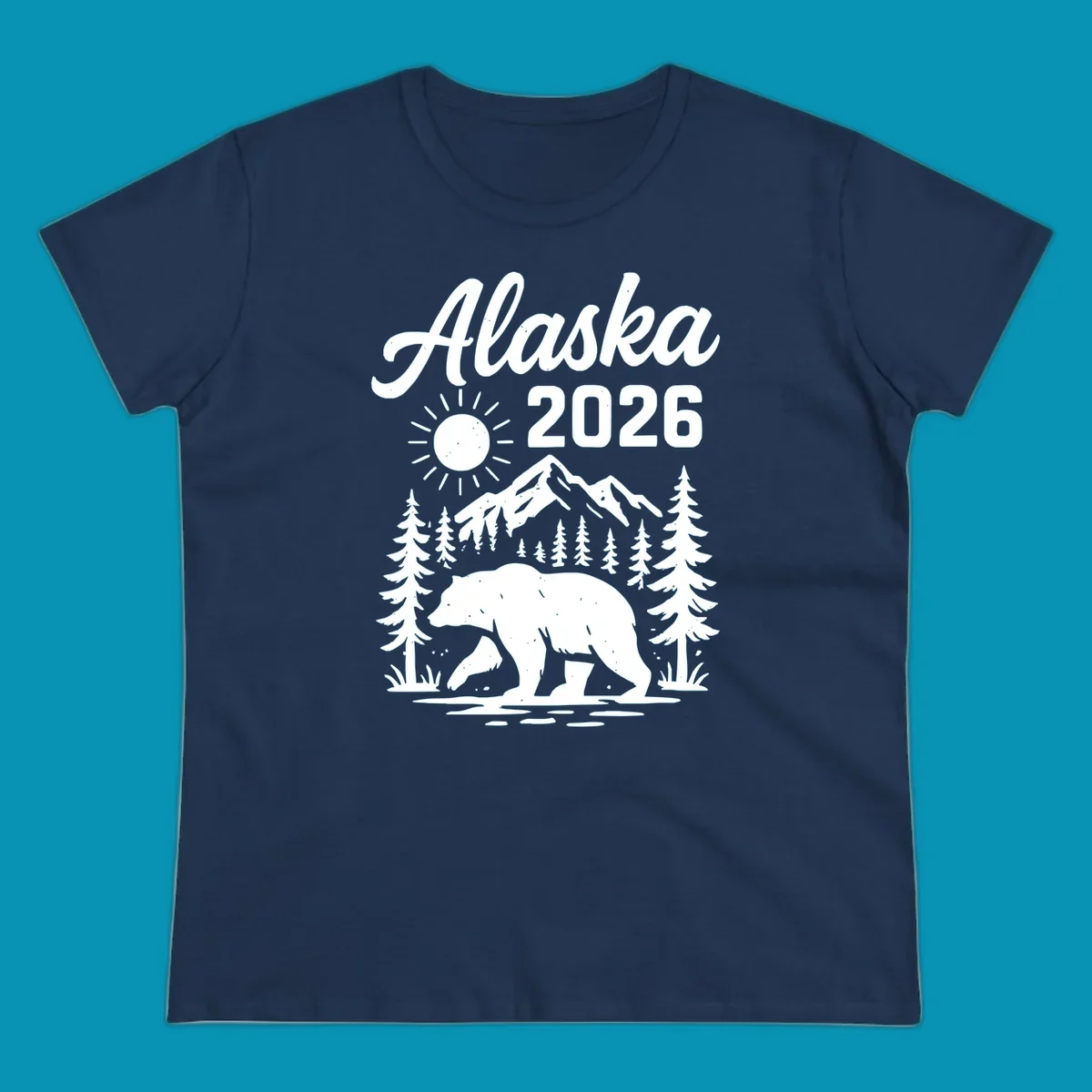 Alaska 2026 design featuring a polar bear walking through snowy mountains surrounded by evergreen trees and bright sun