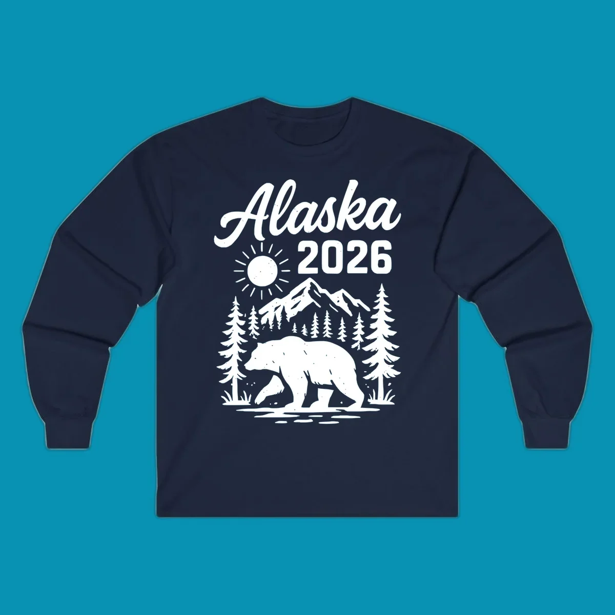 Alaska 2026 design featuring a polar bear walking through snowy mountains surrounded by evergreen trees and bright sun