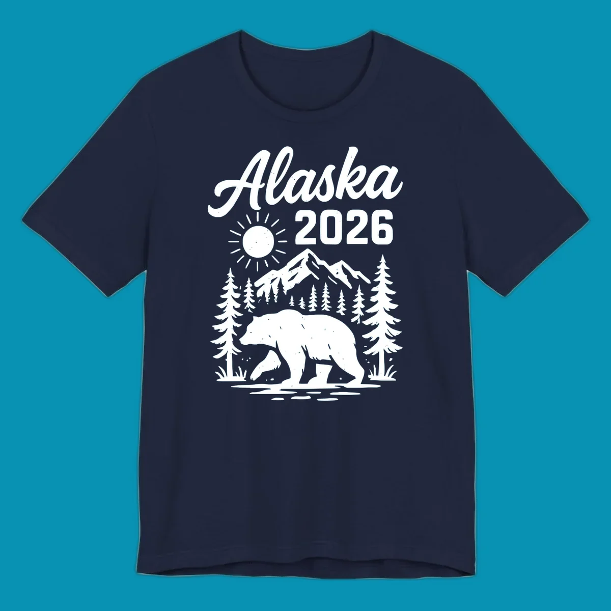 Alaska 2026 design featuring a polar bear walking through snowy mountains surrounded by evergreen trees and bright sun
