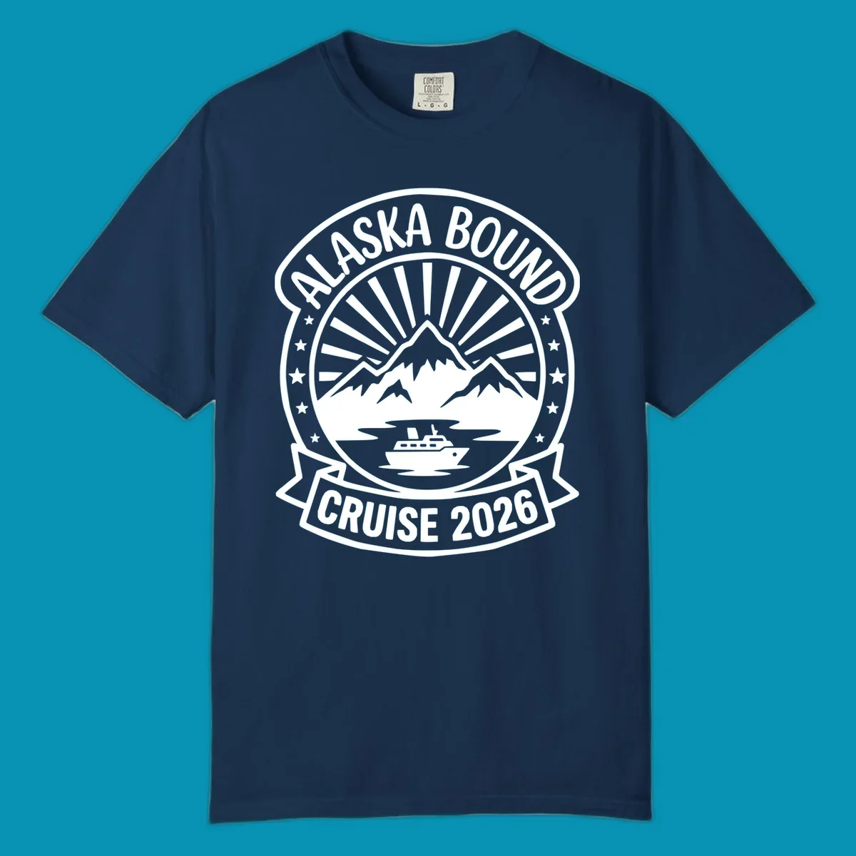 Vintage circular badge with 'Alaska Bound Cruise 2026' text, featuring snow-capped mountains, cruise ship, and radiating sun rays