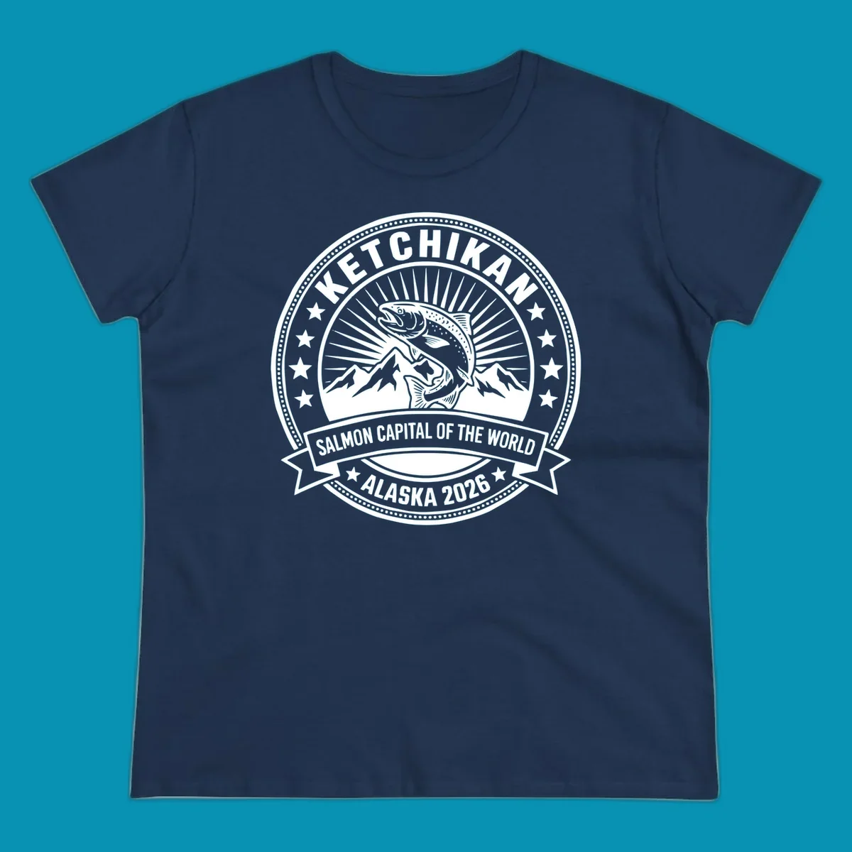 Ketchikan salmon capital badge with leaping salmon, mountain peaks, stars, and circular frame design