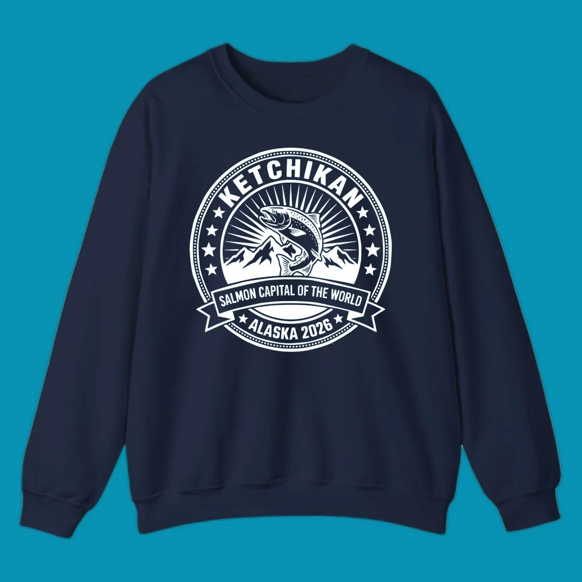 Ketchikan salmon capital badge with leaping salmon, mountain peaks, stars, and circular frame design