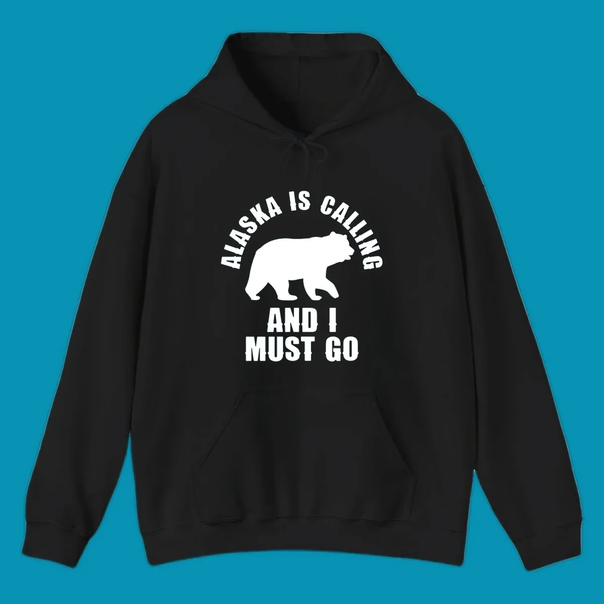 White bear silhouette with curved text reading 'Alaska is calling and I must go' on gray background