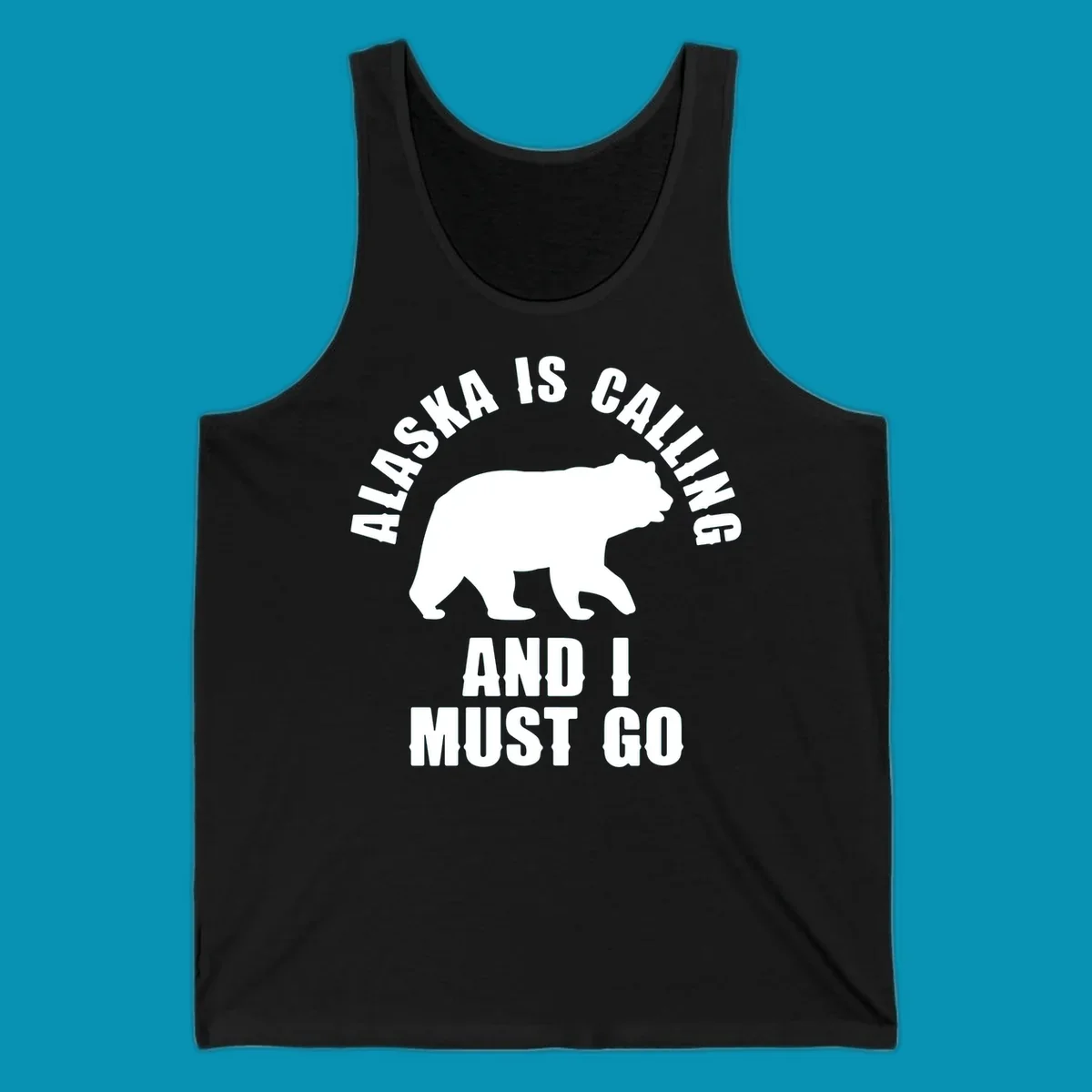 White bear silhouette with curved text reading 'Alaska is calling and I must go' on gray background