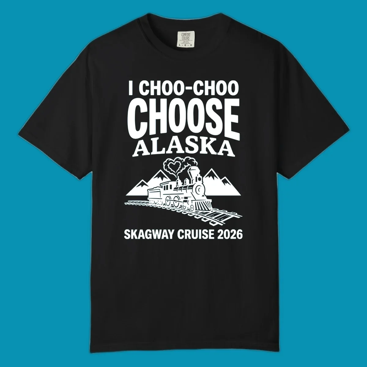 Choo-choo-choose-skagway design: vintage steam locomotive on tracks with mountains and heart-shaped steam cloud, text reads I Choo-Choo Choose Alaska Skagway Cruise 2026