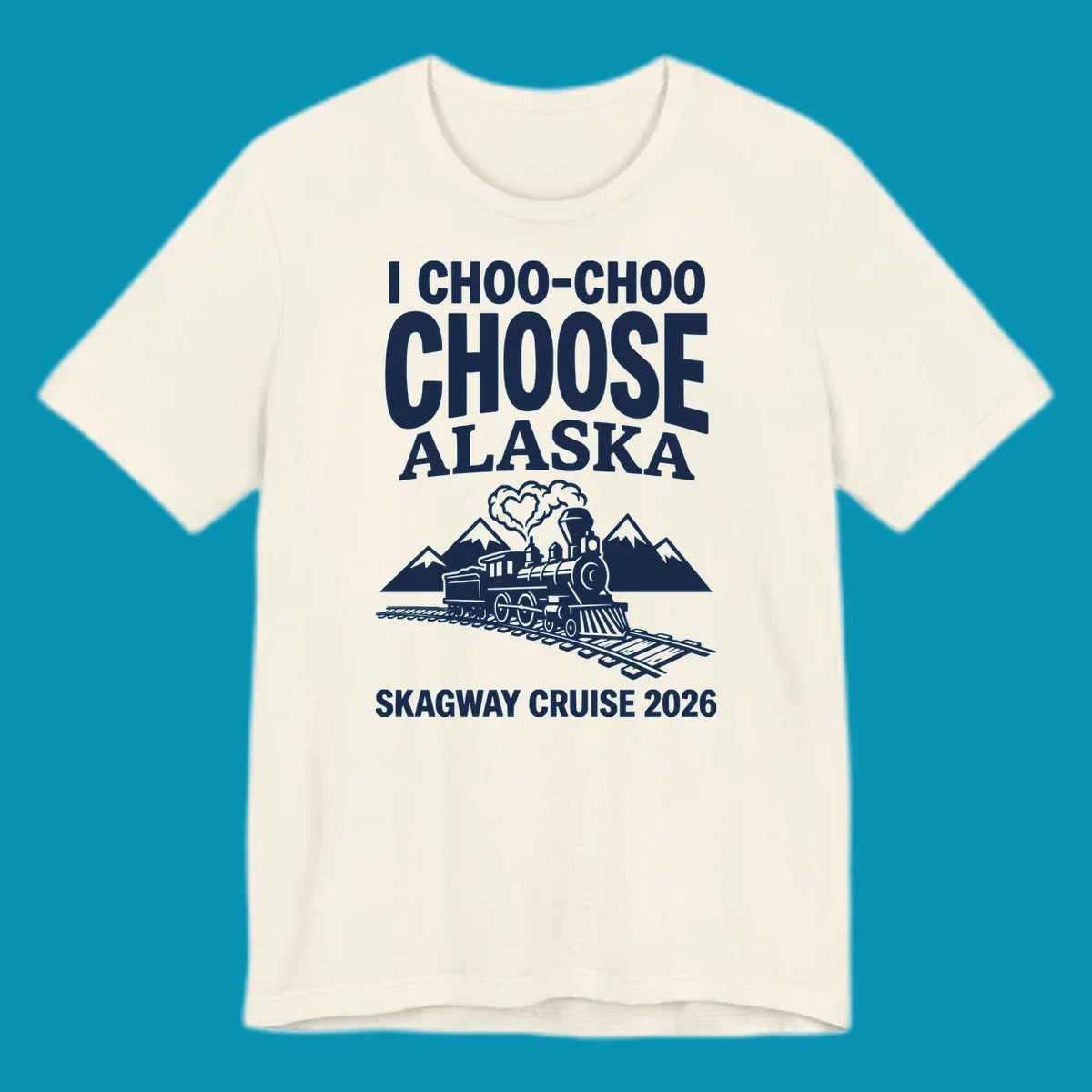 Choo-choo-choose-skagway design: vintage steam locomotive on tracks with mountains and heart-shaped steam cloud, text reads I Choo-Choo Choose Alaska Skagway Cruise 2026