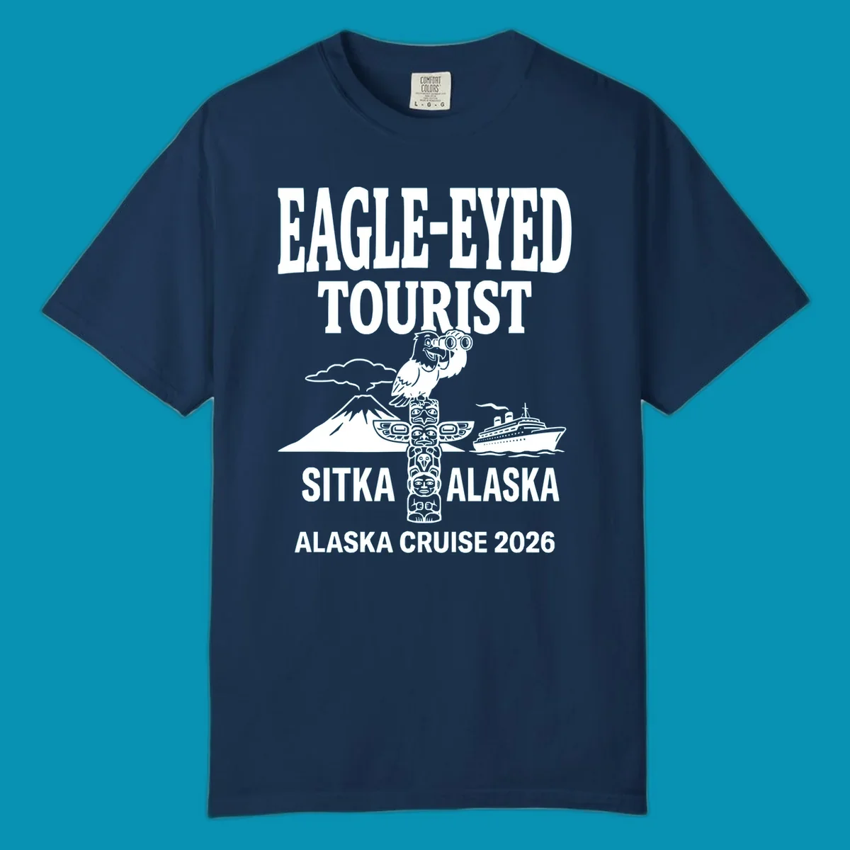 Eagle-eyed tourist design featuring a bald eagle with binoculars, snow mountain, totem pole, and cruise ship for Sitka Alaska 2026