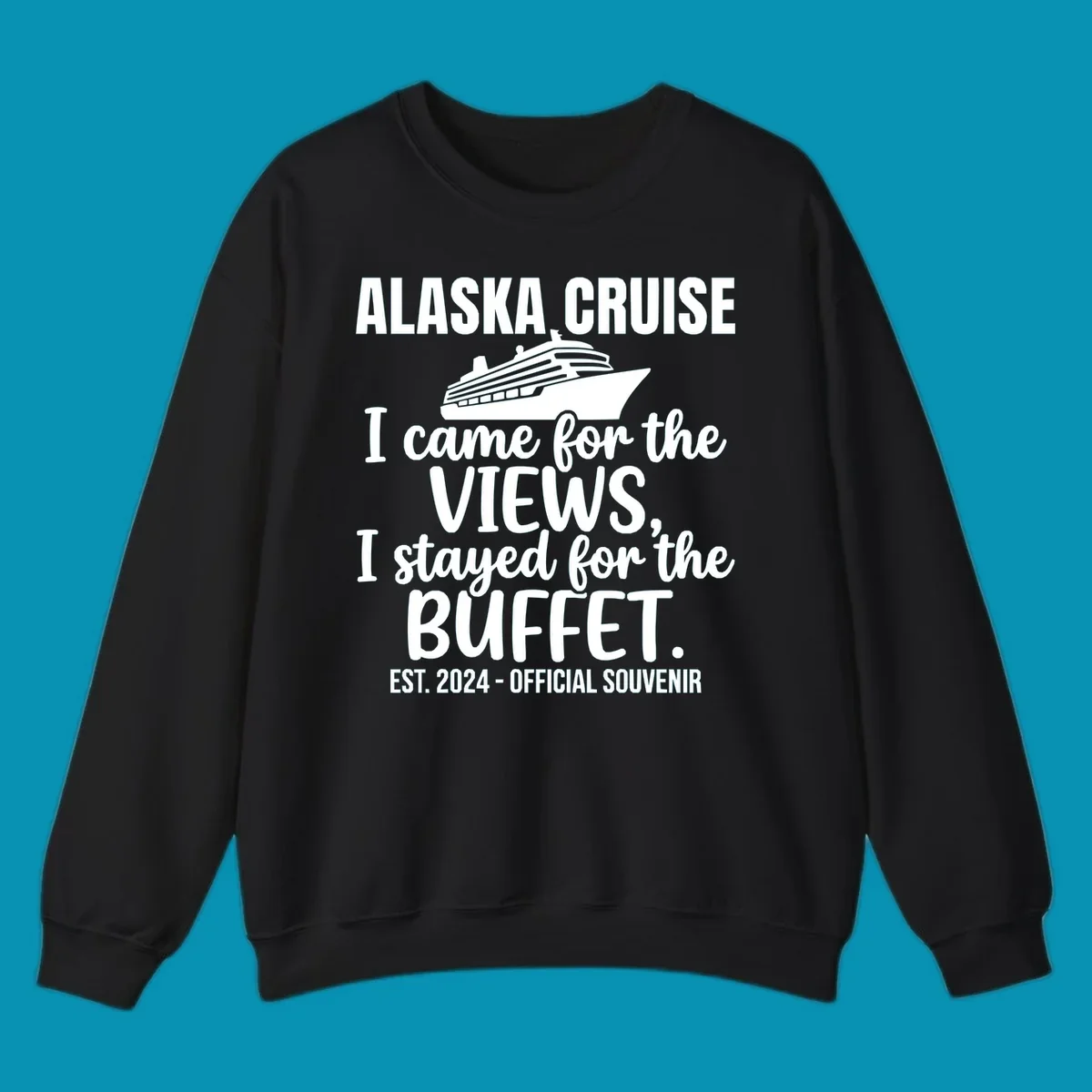 Gray t-shirt design with white cruise ship illustration and text reading 'I came for the views, I stayed for the buffet' — a funny Alaska cruise souvenir design