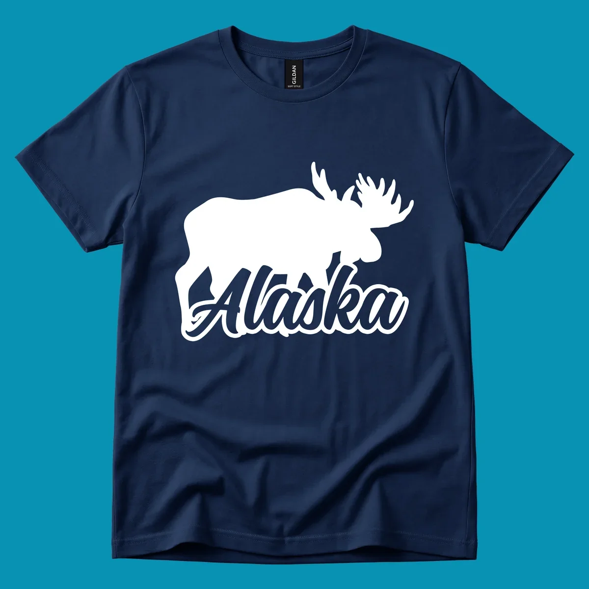 White moose silhouette with branching antlers above stylized 'Alaska' text in gray lettering on gray background