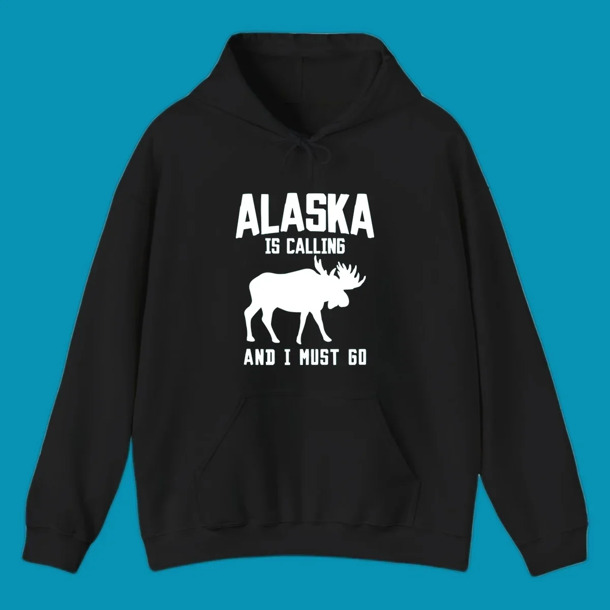 White moose silhouette with text 'Alaska Is Calling And I Must Go' on gray background—Alaska is calling moose design