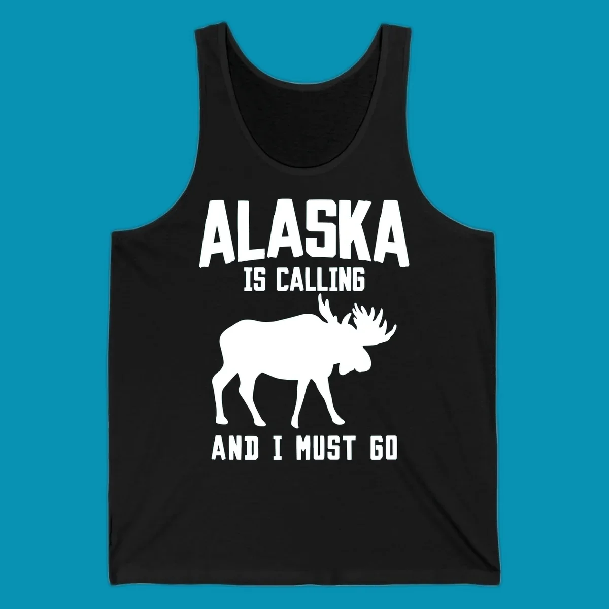 White moose silhouette with text 'Alaska Is Calling And I Must Go' on gray background—Alaska is calling moose design