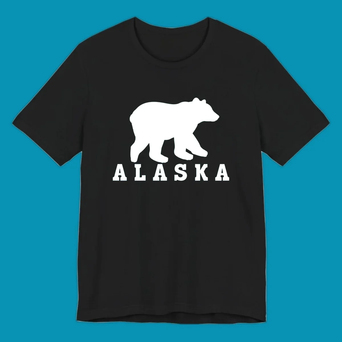 White bear silhouette standing with front paws visible, Alaska text below with pine tree accents on gray background