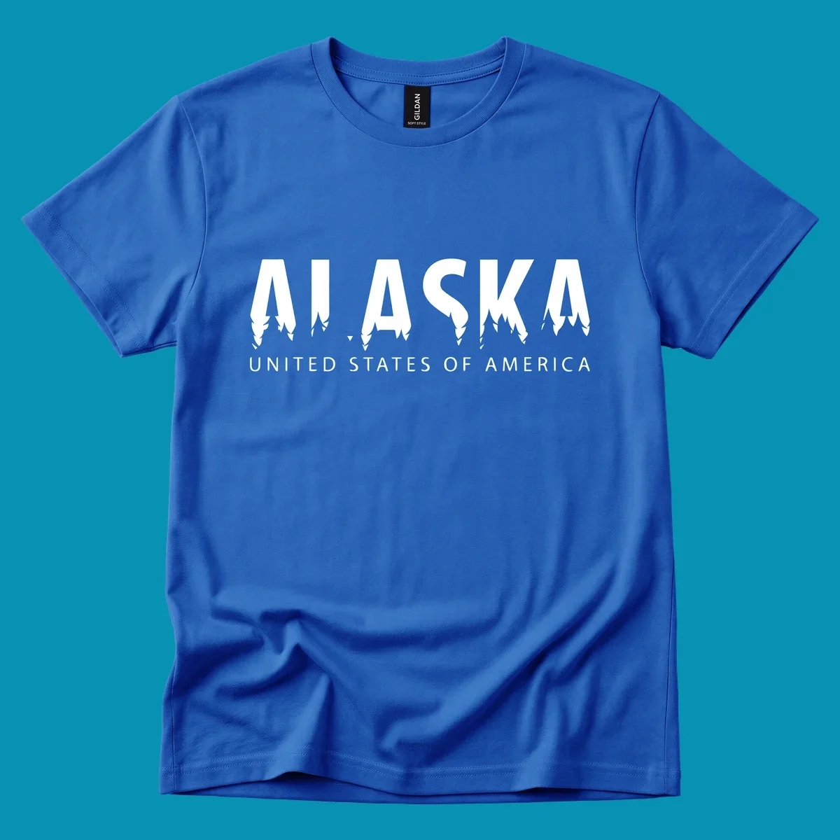 Alaska pine forest map design featuring white letters with integrated tree silhouettes and "United States of America" text on gray background