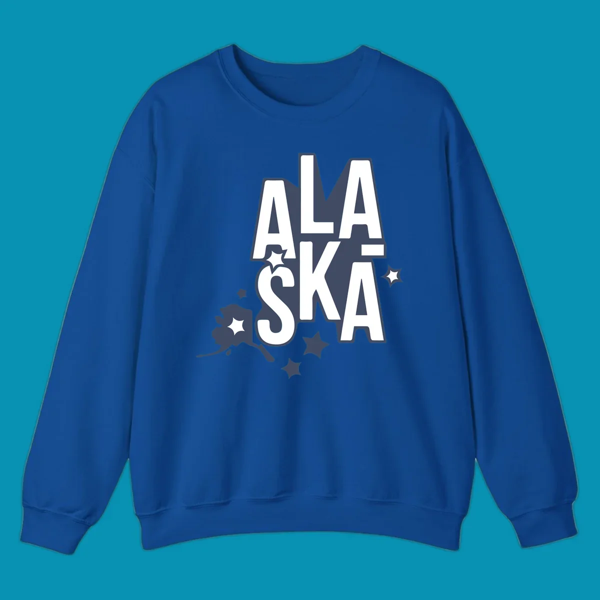 Alaska adventure lettering design with bold outlined text, decorative stars, and botanical accents in navy and white