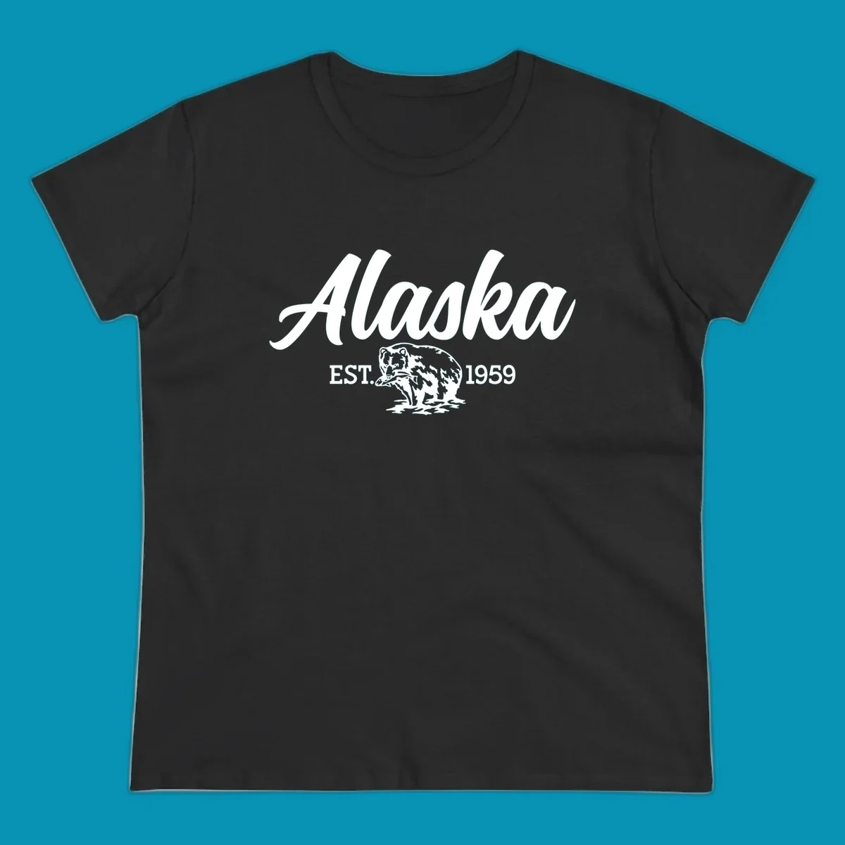 Vintage-style alaskan bear badge design with script lettering and established 1959 date on gray background