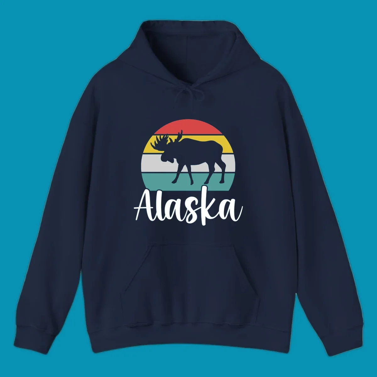White moose silhouette against red, gold, gray, and teal horizontal stripes in a circular badge design representing Alaska mountains and wildlife.