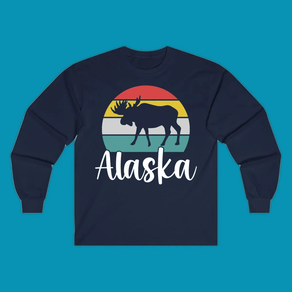 White moose silhouette against red, gold, gray, and teal horizontal stripes in a circular badge design representing Alaska mountains and wildlife.