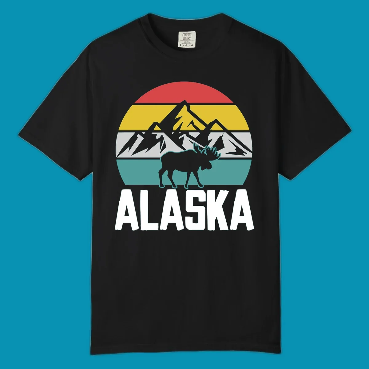 Moose mountain Alaska badge with white moose silhouette, snow peaks, and horizontal landscape stripes in red, gold, gray, and teal.