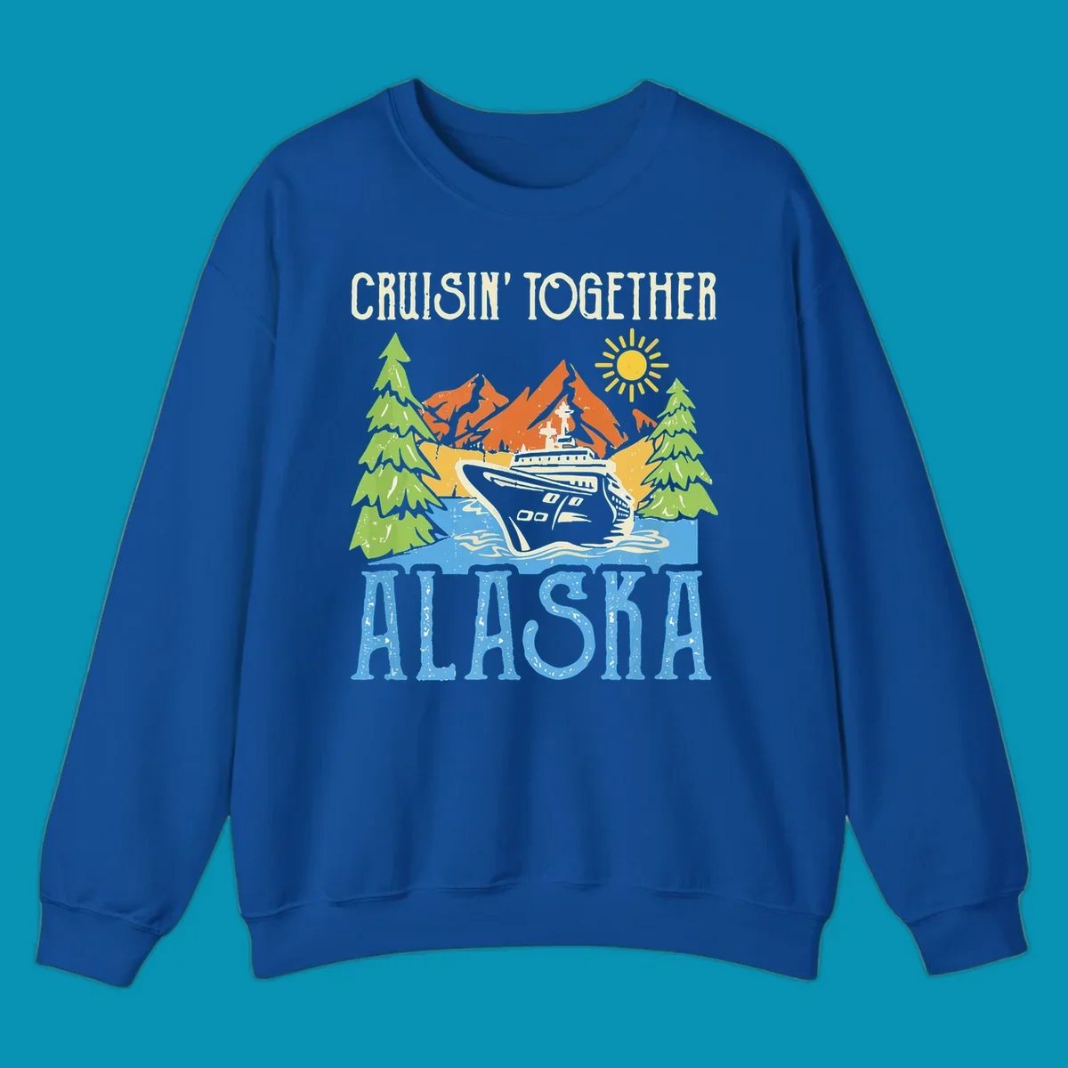 Cruisin' Together Alaska design featuring a cruise ship in front of snow-capped mountains, evergreen trees, and bright sun with distressed lettering