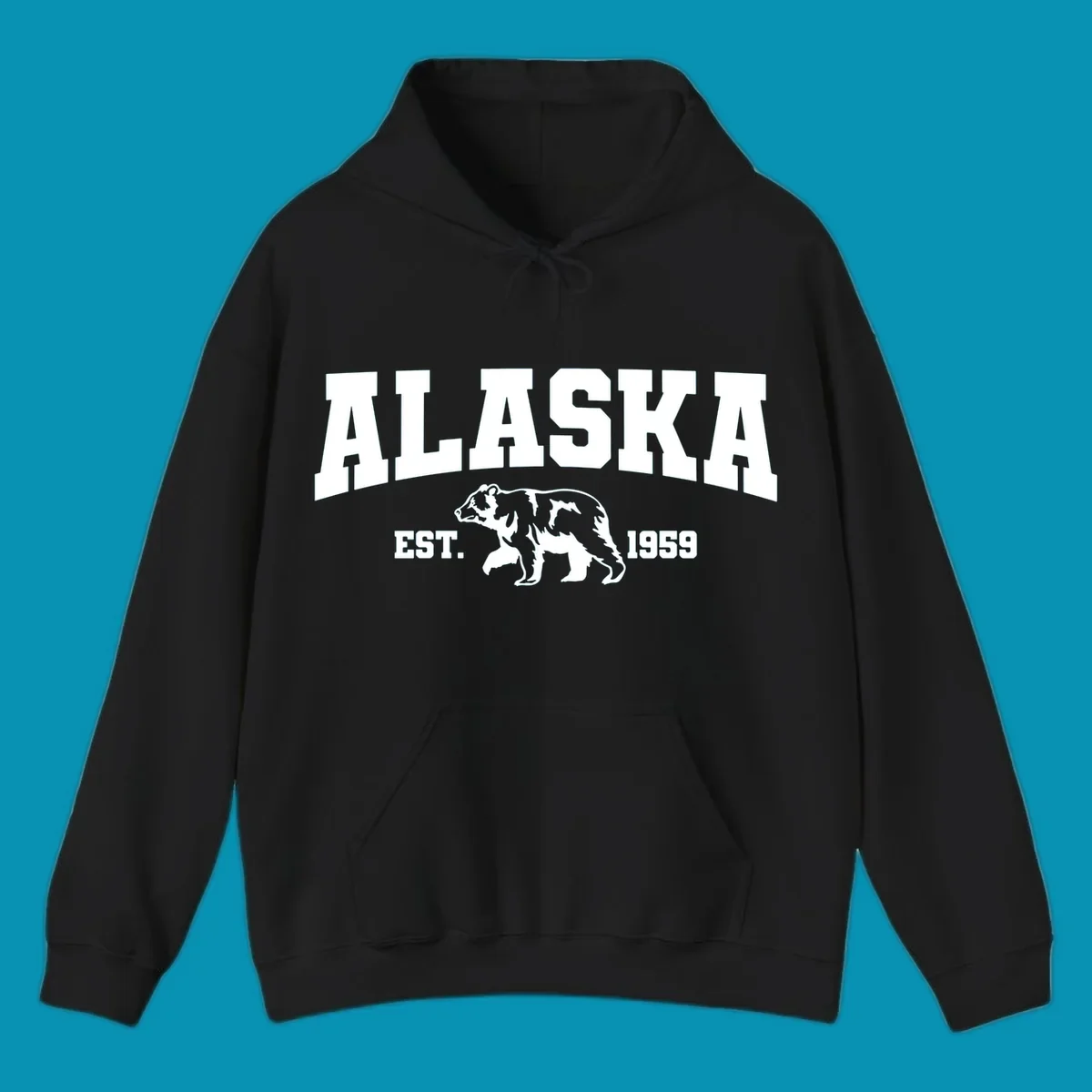 Vintage-style Alaska bear design with distressed lettering, established 1959, featuring pine trees and wildlife illustration