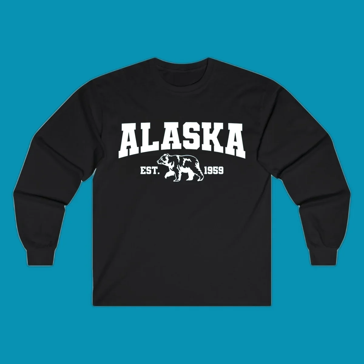 Vintage-style Alaska bear design with distressed lettering, established 1959, featuring pine trees and wildlife illustration
