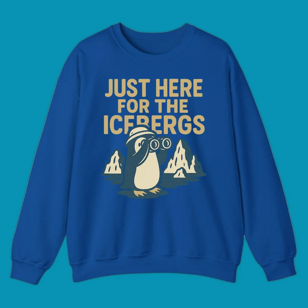 Vintage-style penguin explorer with binoculars among icebergs and 'Just Here For The Icebergs' text, Alaska cruise design