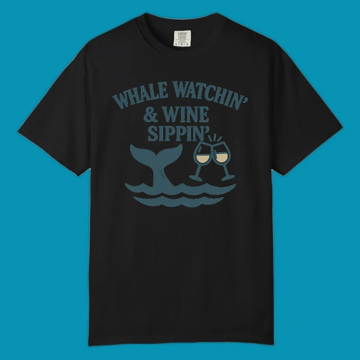 Whale tail and wine glasses illustration with text 'Whale Watchin' & Wine Sippin' for Alaska cruise shirts