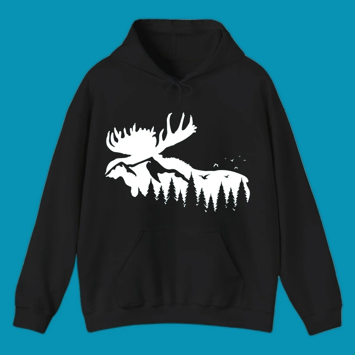 White silhouette of a moose with large antlers integrated into a forested mountain landscape with evergreen trees and flying birds against gray background.