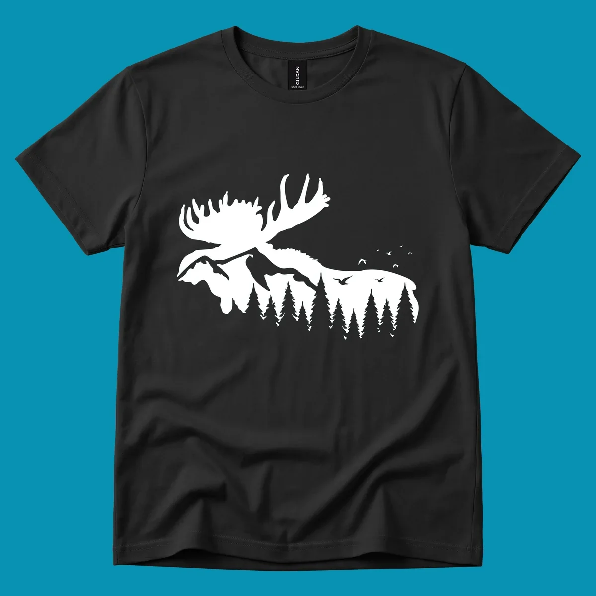 White silhouette of a moose with large antlers integrated into a forested mountain landscape with evergreen trees and flying birds against gray background.