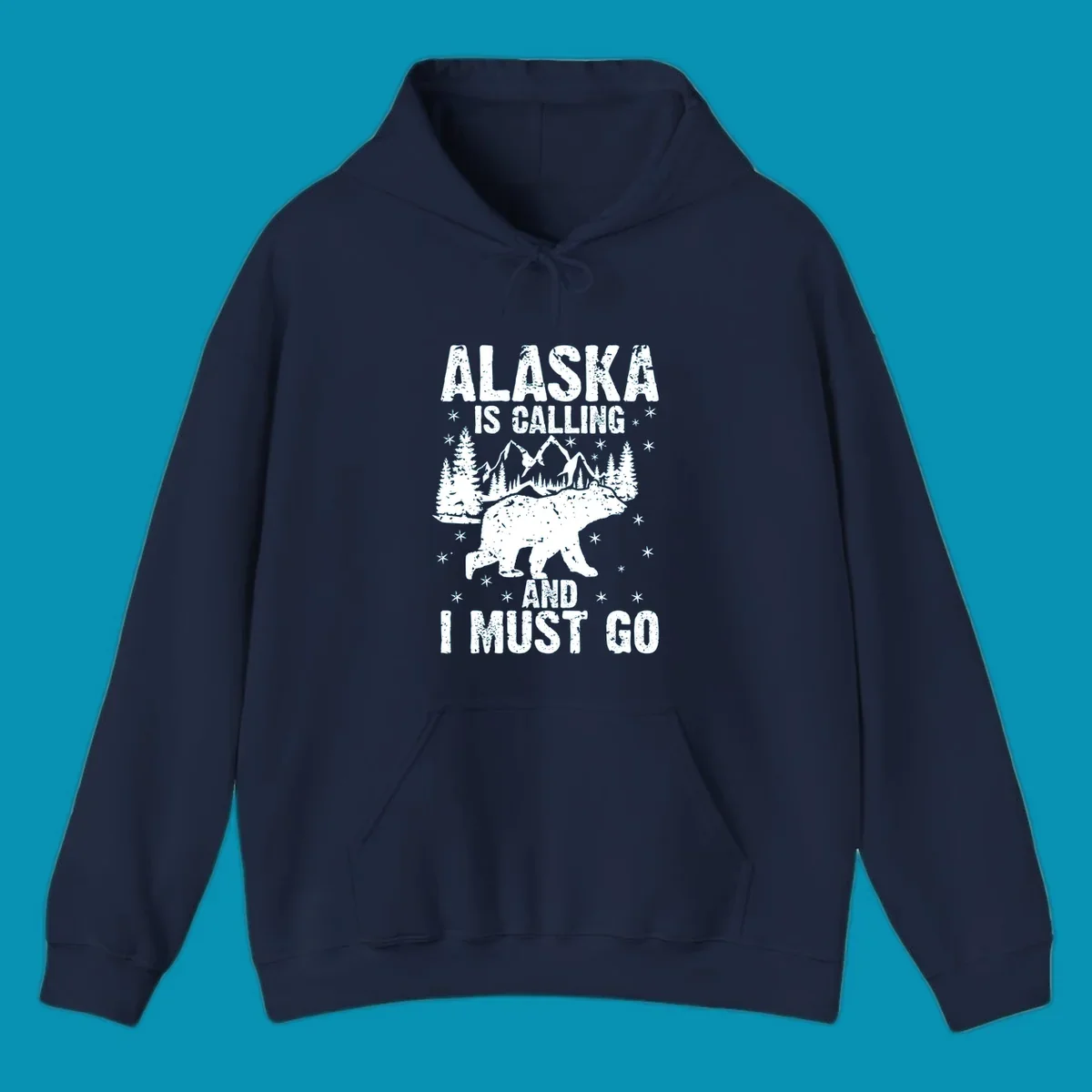 Distressed vintage design with polar bear in snowy mountains, text reads 'Alaska Is Calling And I Must Go'