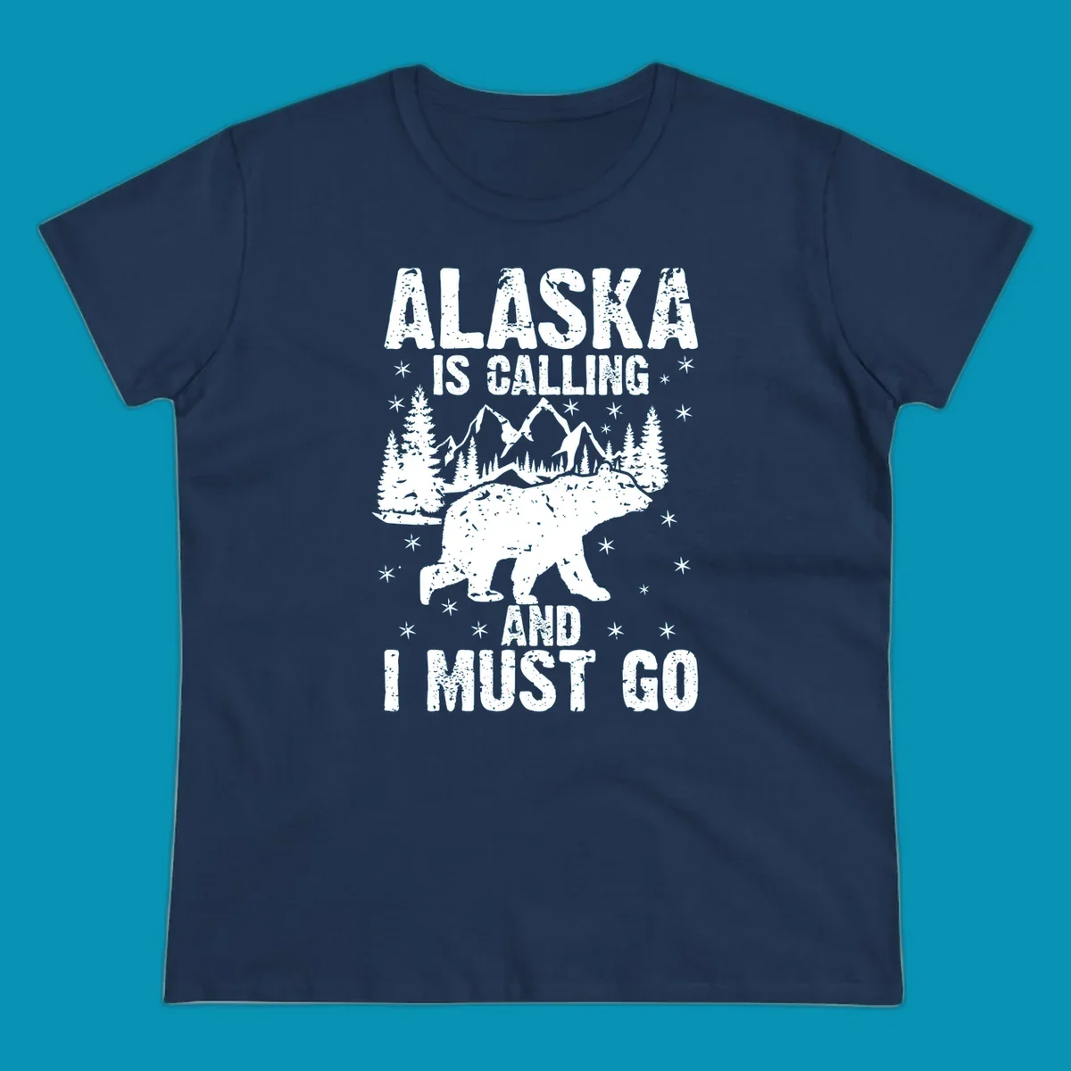 Distressed vintage design with polar bear in snowy mountains, text reads 'Alaska Is Calling And I Must Go'
