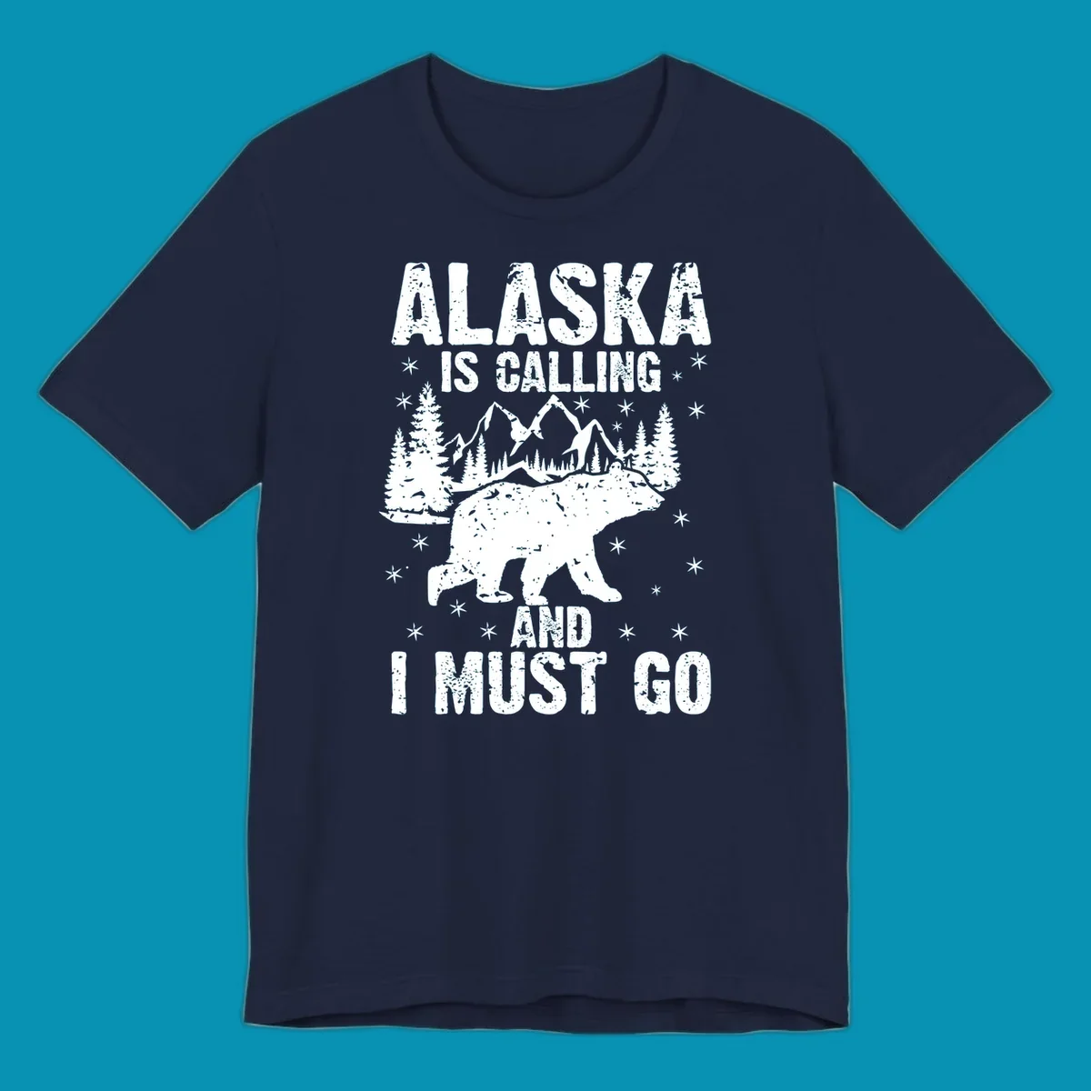 Distressed vintage design with polar bear in snowy mountains, text reads 'Alaska Is Calling And I Must Go'