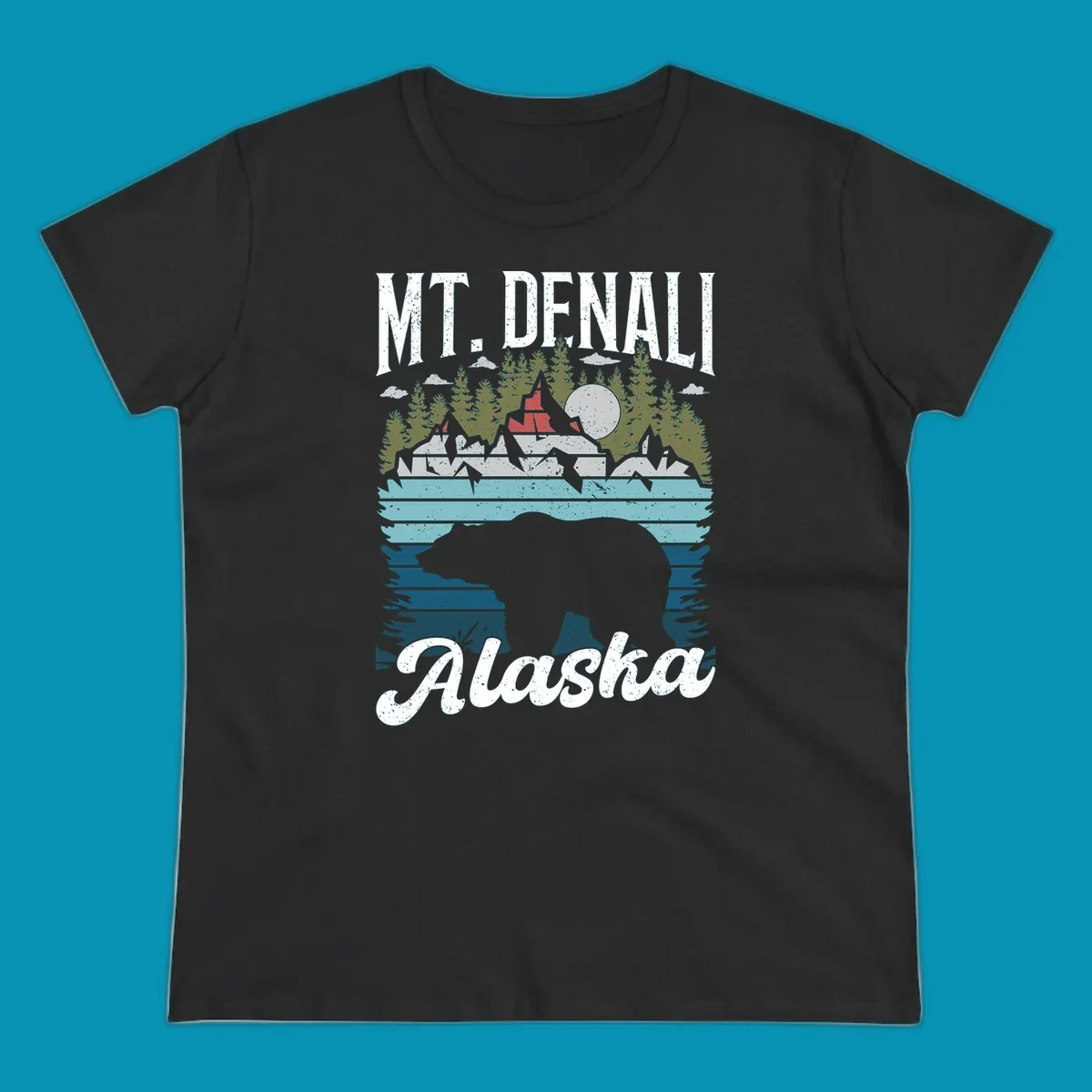 Bear cave winter wonderland illustration with bear head silhouette, snow cabin, evergreen forest, frozen lake, and moon for Alaska cruise shirt design.