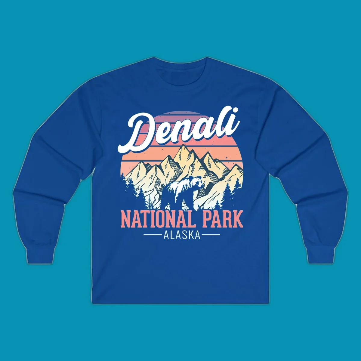 Retro vintage illustration of Denali National Park with snow-capped mountain peaks against a warm coral and peach sunset gradient background with text.