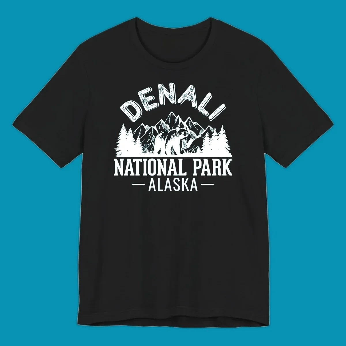 Denali National Park bear design with mountains, evergreen trees, and distressed white text on gray background