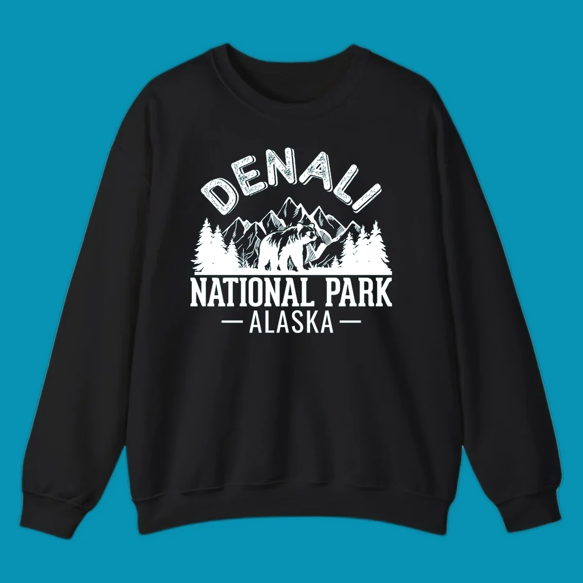 Denali National Park bear design with mountains, evergreen trees, and distressed white text on gray background