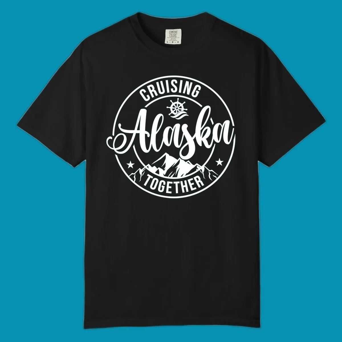 Circular badge with 'Cruising Ashore Together' text, ship wheel, and mountain design in white on gray background