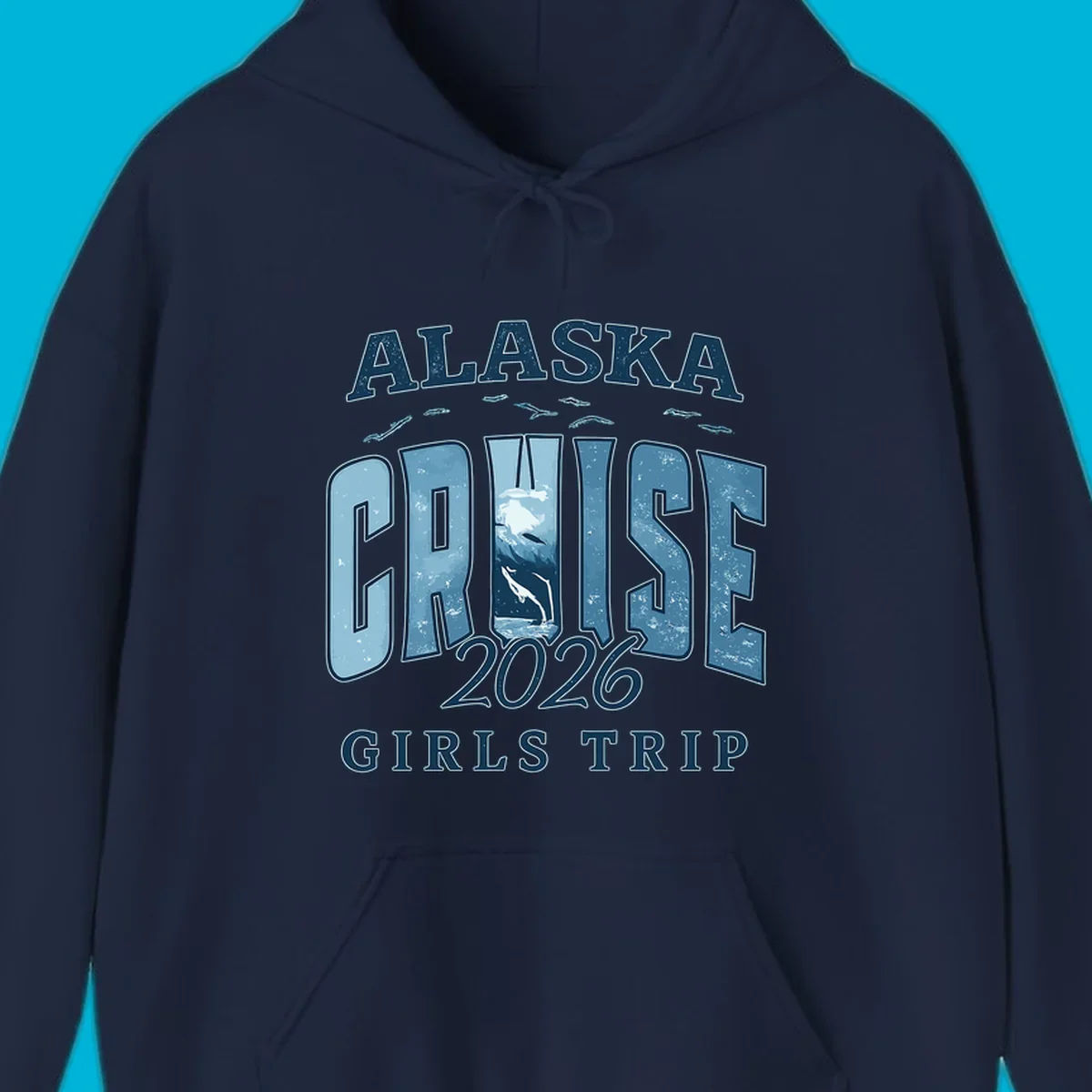 Alaska Cruise 2026 Girls Trip design with whales jumping and swimming within the letters of CRUISE, set against distressed blue text.