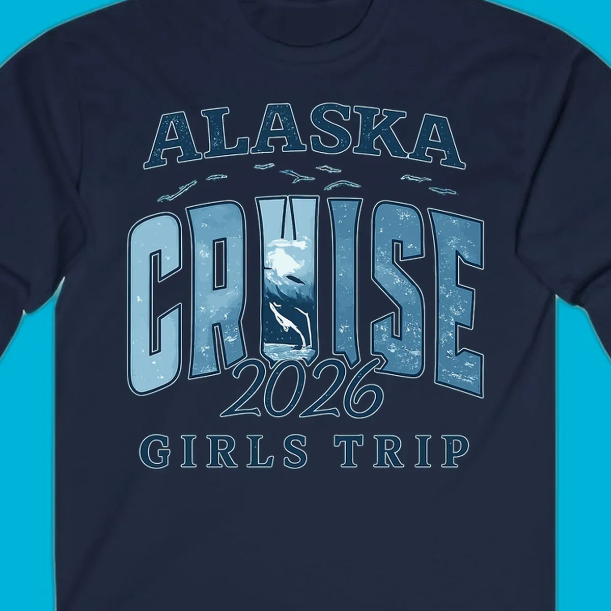 Alaska Cruise 2026 Girls Trip design with whales jumping and swimming within the letters of CRUISE, set against distressed blue text.