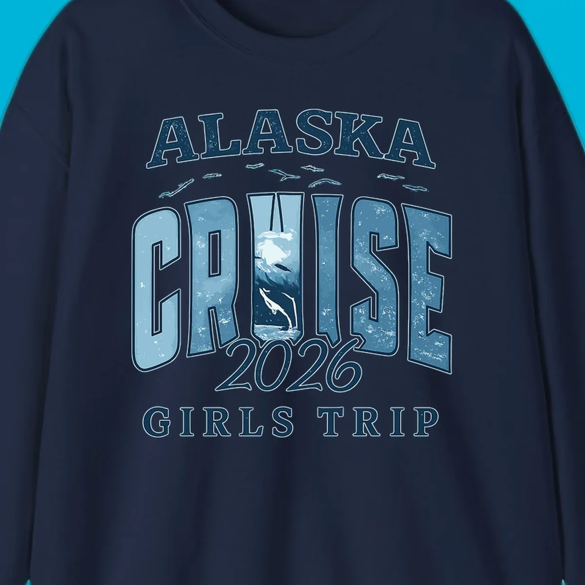 Alaska Cruise 2026 Girls Trip design with whales jumping and swimming within the letters of CRUISE, set against distressed blue text.