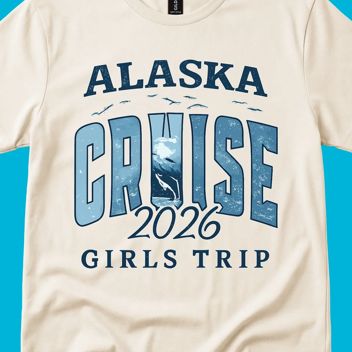 Alaska Cruise 2026 Girls Trip design with whales jumping and swimming within the letters of CRUISE, set against distressed blue text.