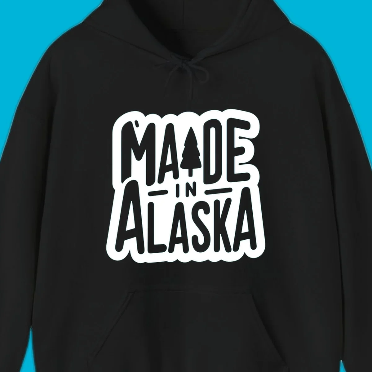Stylized 'MADE IN ALASKA' text with a pine tree silhouette. A made-in-alaska-tree design.