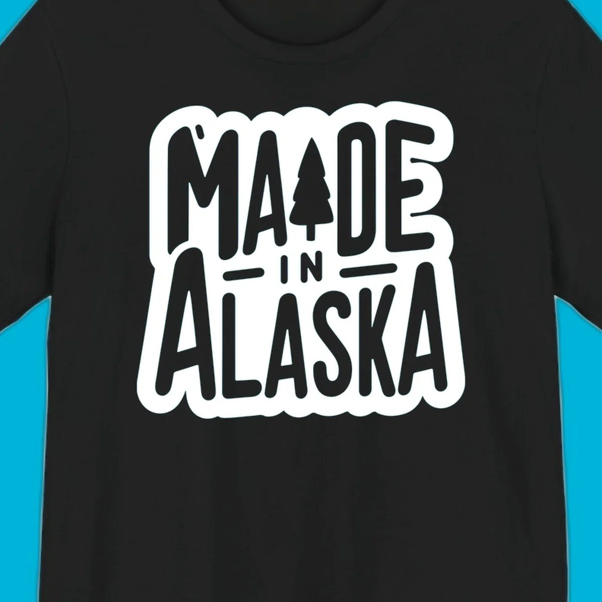 Stylized 'MADE IN ALASKA' text with a pine tree silhouette. A made-in-alaska-tree design.