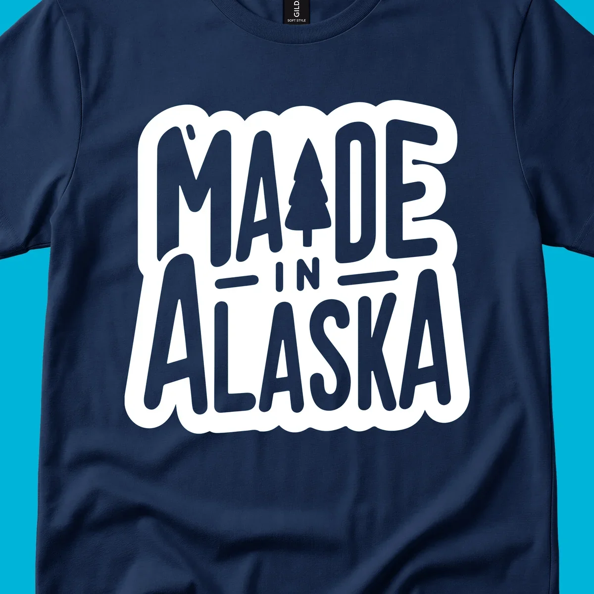 Stylized 'MADE IN ALASKA' text with a pine tree silhouette. A made-in-alaska-tree design.