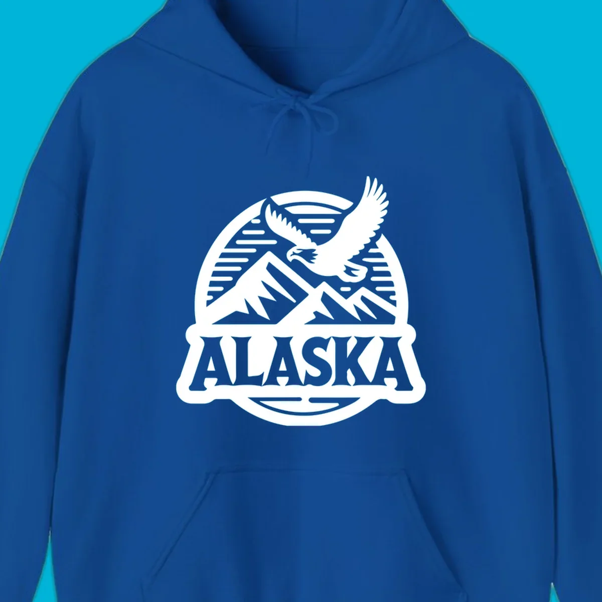 Vintage Alaska badge design with a flying eagle over mountains and 'ALASKA' text in a banner.