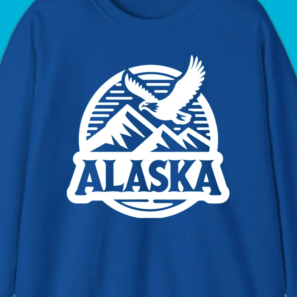 Vintage Alaska badge design with a flying eagle over mountains and 'ALASKA' text in a banner.