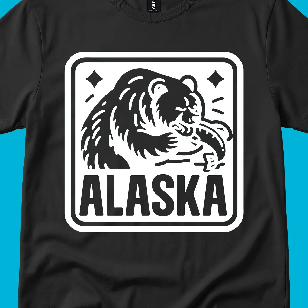 A white alaskan grizzly salmon fishing illustration within a rectangular badge, with 'ALASKA' text.