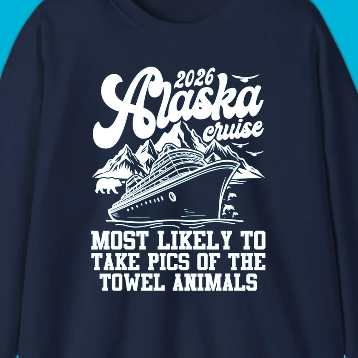 Illustrated design for 2026 Alaska cruise with a ship, mountains, bear, dolphins, and text about taking pics of towel animals.
