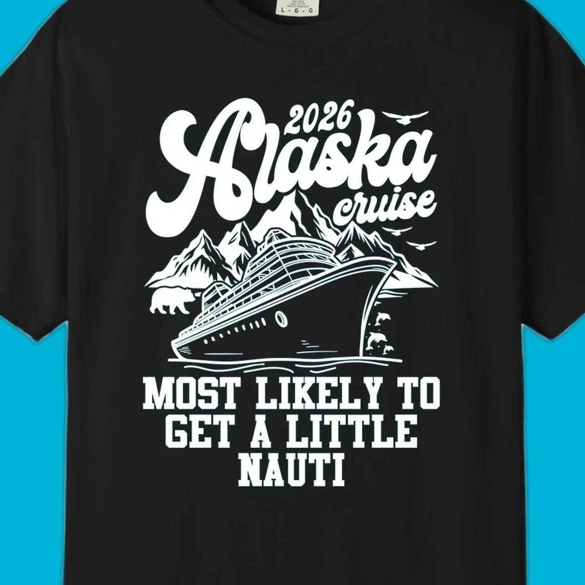 A white (or dark blue) illustrated design for an Alaska 2026 cruise, featuring a ship, mountains, bear, dolphins, and "alaska-nauti-cruise-2026" text.