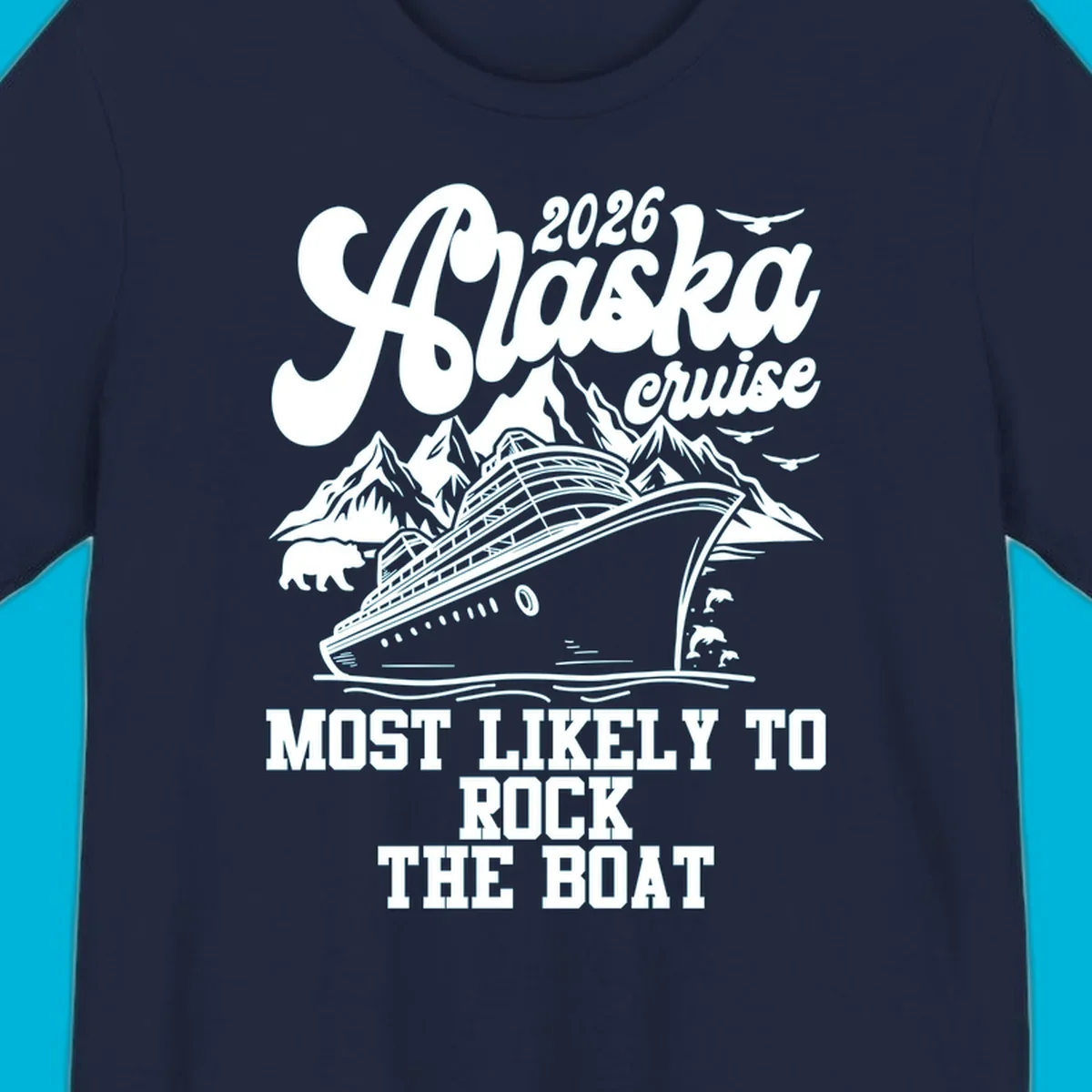 An illustrated Alaska cruise rock the boat design with a ship, mountains, bear, dolphins, and birds.